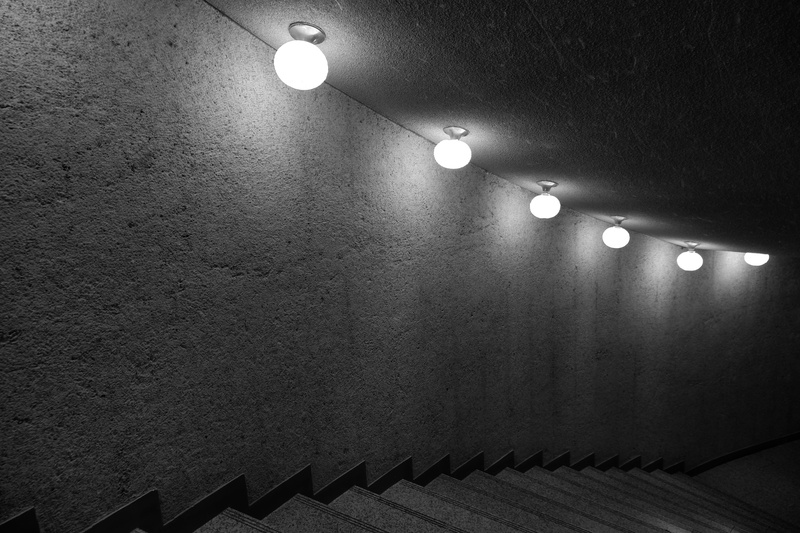 light, down, blank and white, architecture, lights, light - natural phenomenon, indoors, night, electricity, dark indoor, underground, wall, railing, stairway