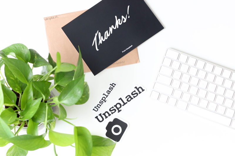 white color, plant part, text, plants, work desk, western script, leaf, united states, nature, indoors, communication, finance, creative, mail, new york