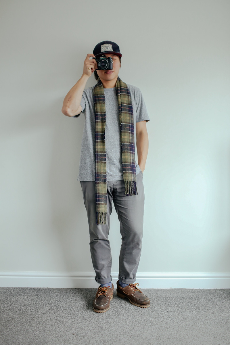 human, man, real people, condo, photography, leisure activity, electronics, camera, woman, wall - building feature, lifestyles, sweater, cardigan, front view