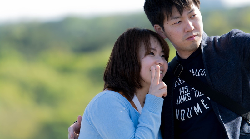stolen shots, selfie, couple, family, uniform, casual clothing, young men, looking, focus on foreground, child, adult, waist up, clothing, childhood, togetherness