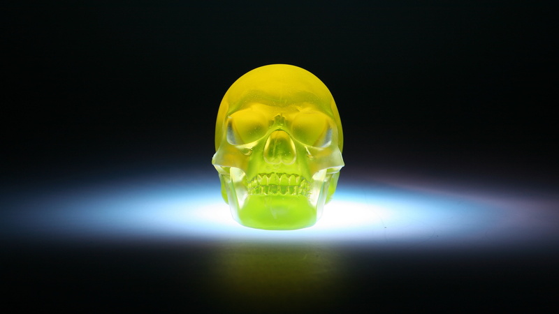 poisonous, indoors, illuminated, protection, skull, bizarre, healthcare and medicine, spotlight, yellow, single object, black background, studio shot, aggression