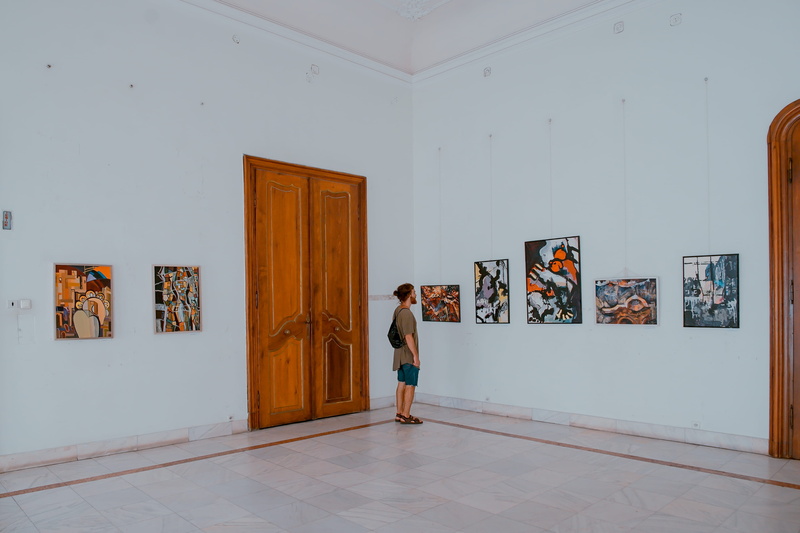 mid adult, flooring, museum, full length, art and craft, painting, wall, paintings, inside, landscape, romanium, women, leisure activity, wall - building feature