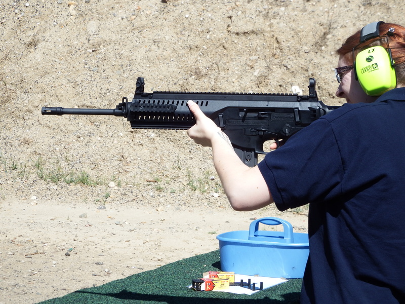 girl, target shooting, aiming, ar15, outdoors, one person, ar-15, automatic, rifle, gun, woman, real people, warm clothing, men, field, aggression, firearm