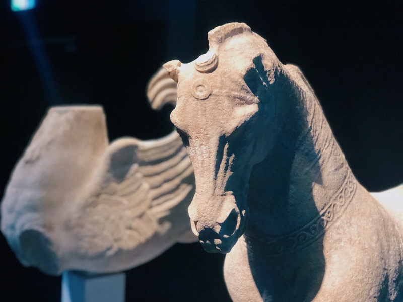 vulture, hand, sphere, art and craft, art, leisure activities, dinosaur, statue, extinct, bird, archaeology, focus on foreground, symbol, pegasus, greek