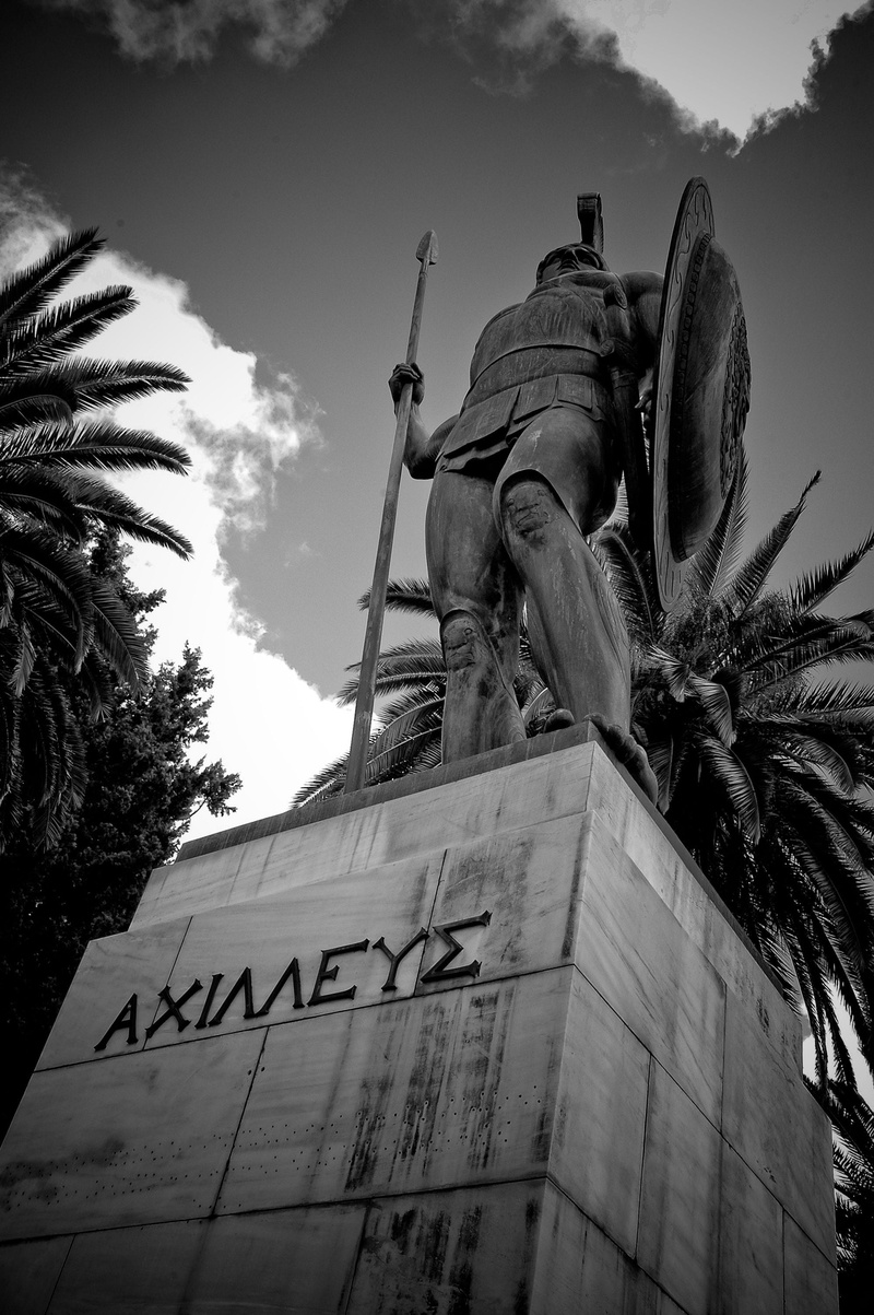 monument, palm tree, text, day, stone, antique, outdoors, white, low angle view, mythology, human representation, marble, tree, sculpture, black, representation