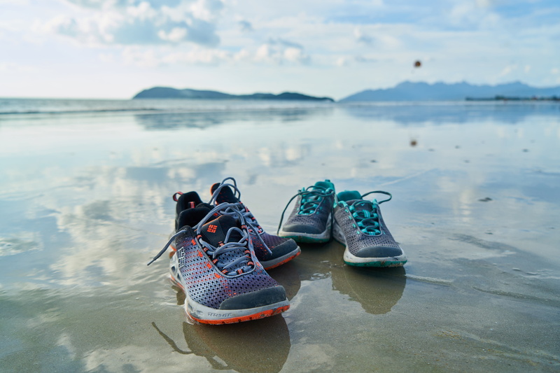 cloud - sky, compatibility, sky, shore, lake, slipper, focus on foreground, tranquility, reflection, outdoors, shoe, waterfront, ocean, water, cloud, shoes