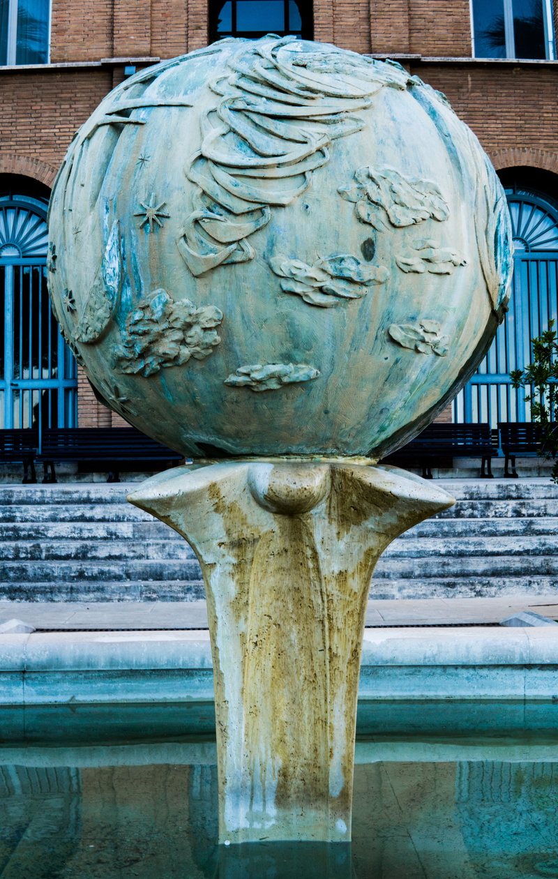 centerpeice, masonry, male likeness, 5K, rome, sculpture, sculpt, gree, water, wood - material, abstract art, globe, day, carving - craft product, representation