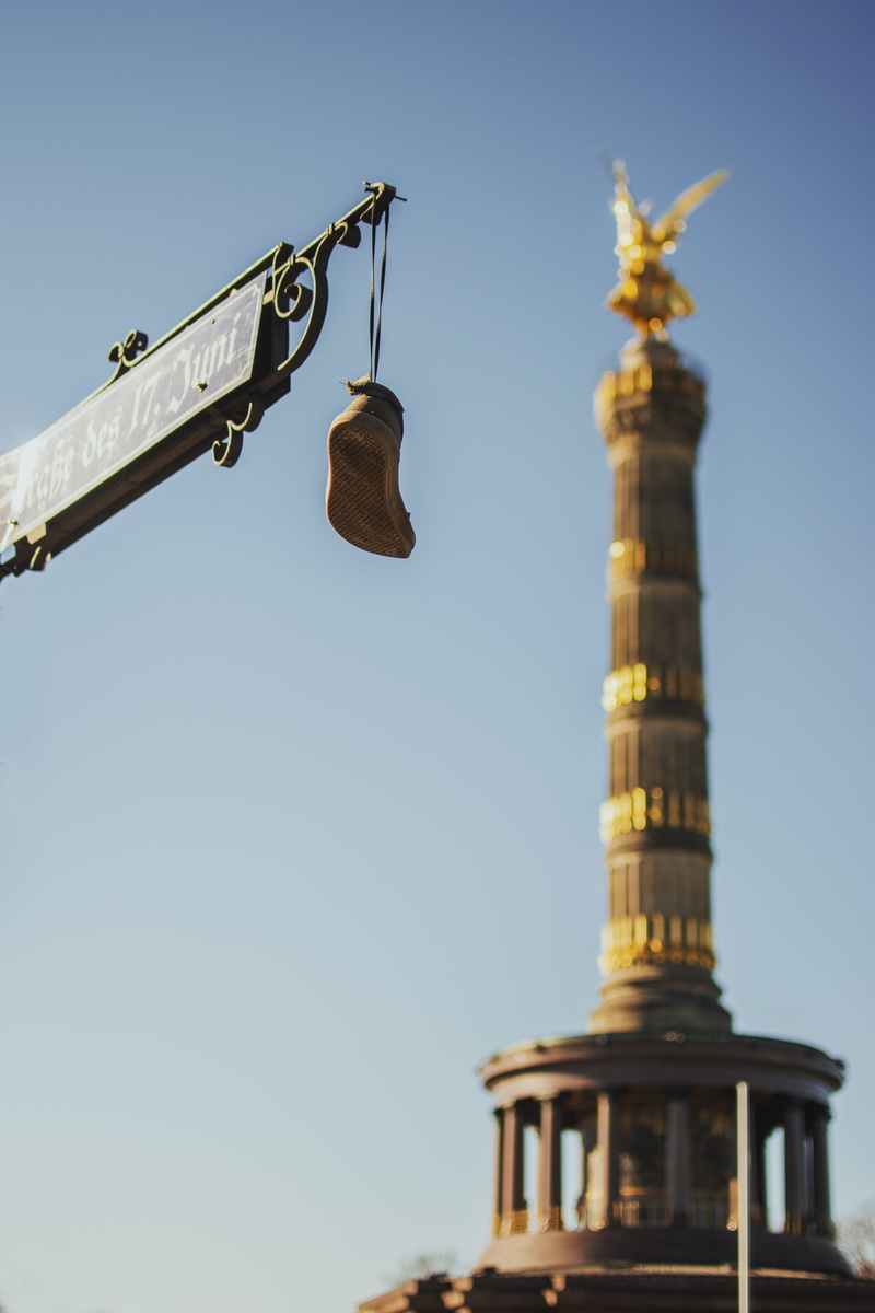 minimalism, gold colored, focus, travel, monument, building exterior, day, spire, clear sky, religion, urban, street, tourism, hanging, city, germany, no people