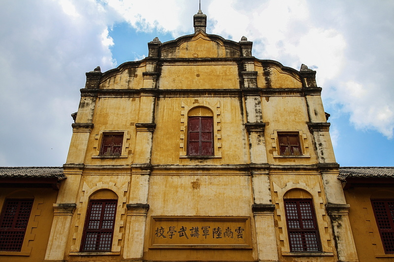sky, architecture, building, door, building exterior, built structure, religion, window, yun nan, low angle view, history, belief, spirituality, cloud - sky