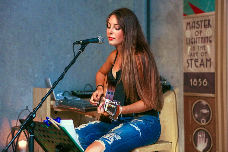 people, performance, playing, singing, holding, musician, recording, rock music, casual clothing, hair, guiatar, public domain, females, caucasian Ethnicity