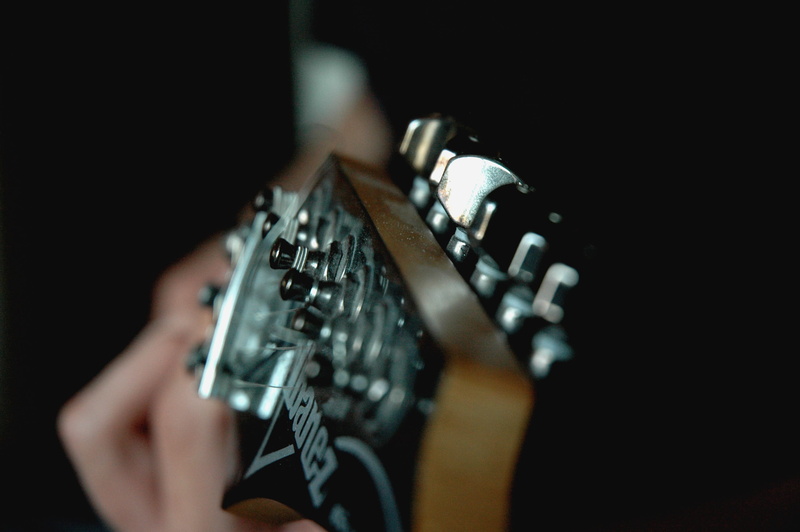 black background, musician, one person, close-up, finger, plucking an instrument, human body part, playing, string, Guitar, sound, human Hand, 2K, musical equipment
