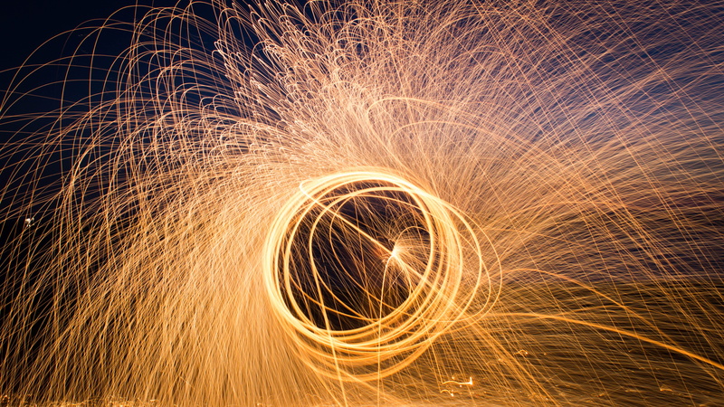 night, firework display, speed, flames, spinning, geometric shape, blurred motion, outdoors, wire wool, sparks, dark, motion, sign, bright, night time