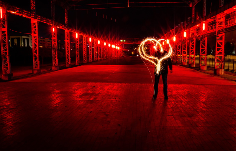 motion, industrial, long exposure, sign, performance, arts culture and entertainment, one person, behind, standing, adult, front view, nightlife, lightpainting