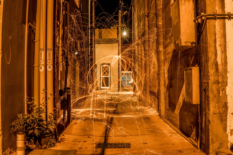 alley, building, magic, fire, 5K, alleyway, motion, outdoors, sparks, glowing, direction, no people, steelwool photography, steel wool, light - natural phenomenon