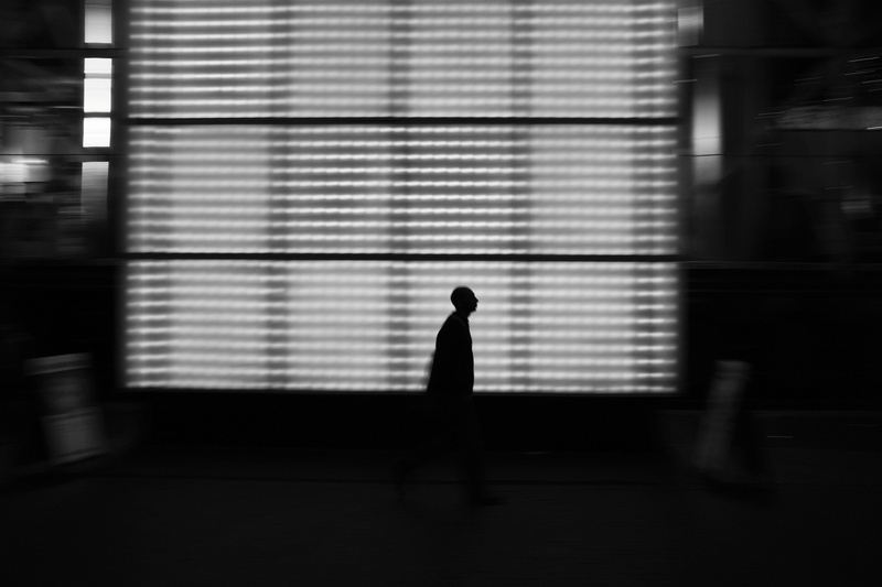 street, movement, near, 5K, unrecognizable Person, motion, black And White, one Person, urban Scene, dark, corridor, person, walking, urban, shadow, male