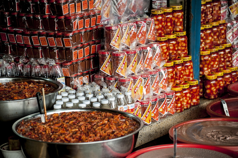 color, large group of objects, market stall, indoors, arrangement, in a row, grocery store, still life, choice, marketplace, stall, place of business, container