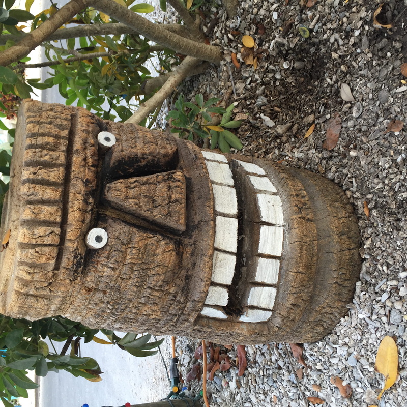 plant part, branch, art, bradenton beach, folk art, united states, day, pattern, tree, metal, hanging, tiki, weathered, wheel, textured, outdoors, carving