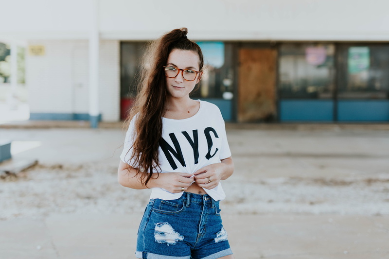 kid, hairstyle, pants, focus on foreground, teenager, clothing, person, young adult, casual clothing, apparel, three quarter length, leisure activity, one person