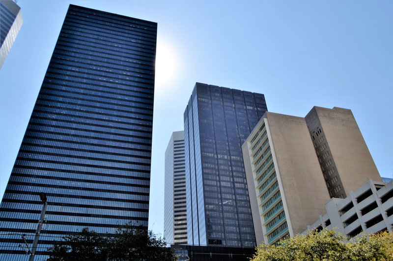 day, low angle view, built structure, wealth, architecture, tower, clear sky, buildings, workplace, reflection, office building exterior, modern, studio