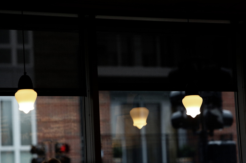 electric lamp, lighting equipment, illuminated, food, focus on foreground, pendant light, light, glass - material, no people, low angle view, building