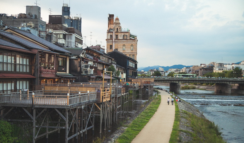 city, incidental people, bridge - man made structure, travel destinations, river, cloud - sky, strand, 4K, connection, building, architecture, bridge