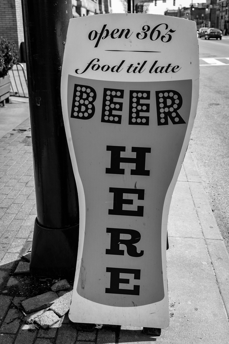 information, tap, advertising, western script, background, tap house, number, street sign, street, sign, signage, text, brewery, city, capital letter, street photography