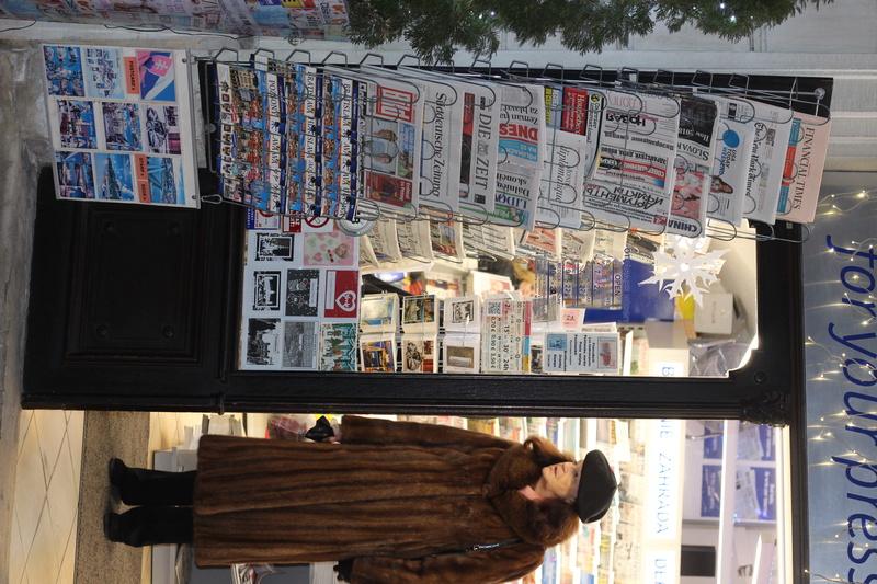 shop, communication, no people, representation, kiosk, day, dog, publication, one animal, slovakia, clothing, silhouette, text, fur, cat, overcoat, bookshop