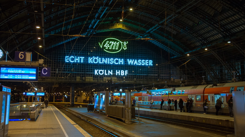 train track, railroad station platform, ceiling, shop, vehicle, text, sign, leisure activities, railway, rail, travel, clock, human, night, 5K, train - vehicle