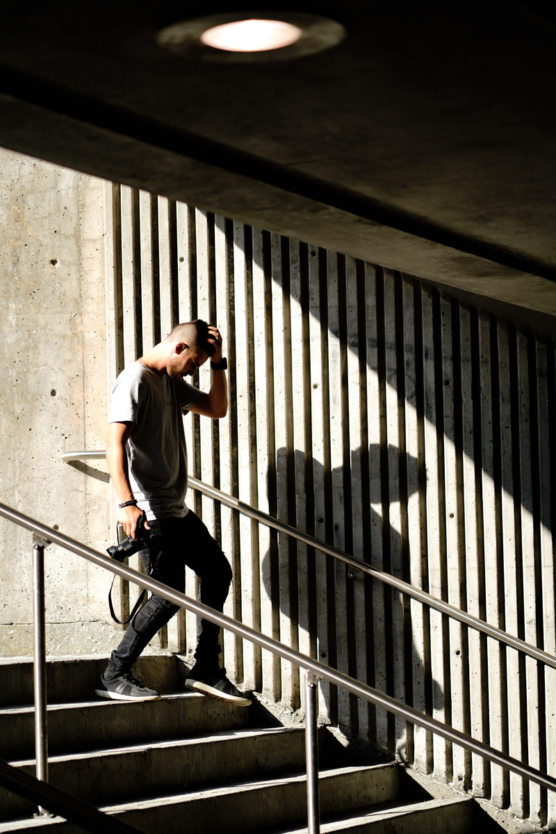 standing, home decor, banister, adult, apparel, 8K, prison, real people, sleeve, leisure activity, lifestyles, shoe, human, pedestrian, footwear, person