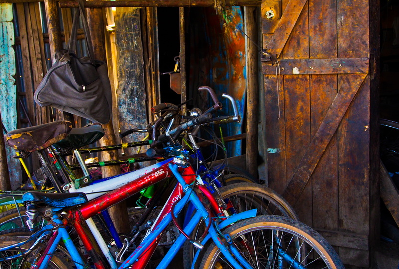 door, bicycle, no people, wheel, bikes, kenya, abandoned, wood - material, transportation, close-up, 4K, ngong hills, building, bike shop, entrance, stationary