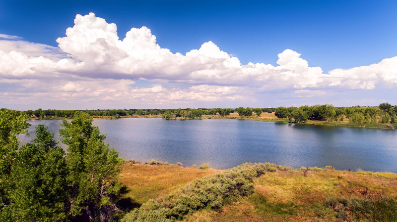 tranquil scene, no people, lake, green color, non-urban scene, pond, fort collins, cloudy sky, tranquility, sky, aerial view, arapahoe bend, colorado, landscape