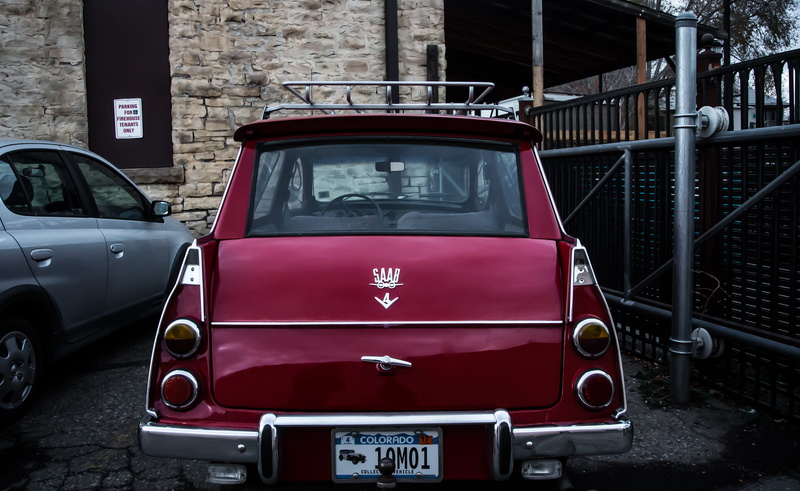 building exterior, vintage, mode of transportation, number, motor vehicle, outdoors, text, city, no people, day, 2K, transportation, fort collins, stationary