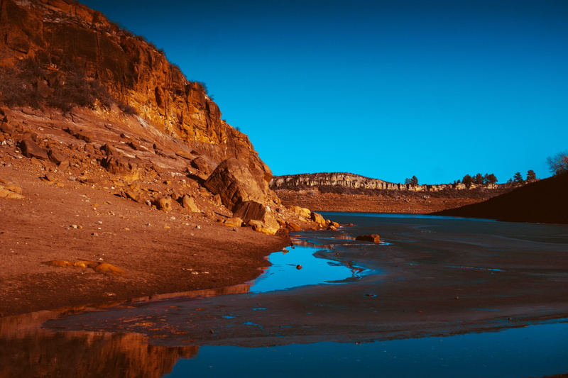 near, eroded, rock formation, land, cliff, scenics - nature, rock - object, no people, canyon, outdoors, beach, valley, lake, 5K, reflection, red and blue