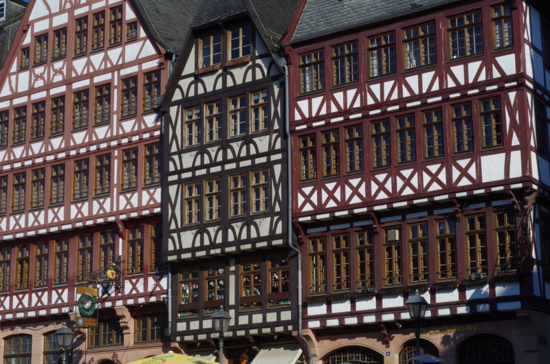 city, residential district, old, town, in a row, repetition, window, medieval, pattern, mode of transportation, day, restaurants, business, building, sunlight