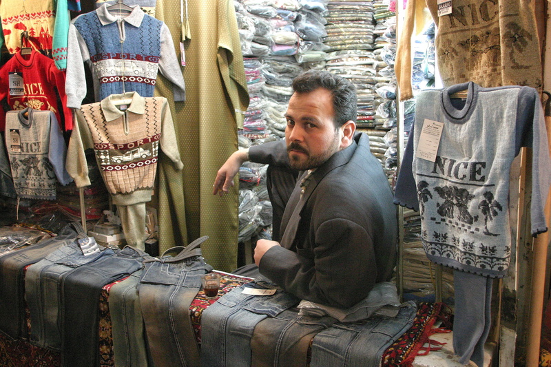 orint, clothing, shopping, small business, fashion, souk, syria, aleppo, facial hair, 2K, bazar, one person, business, working, real people, retail, store