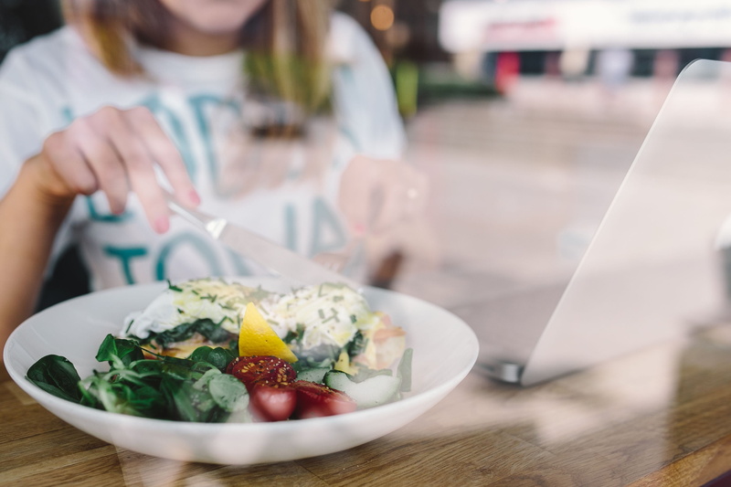 eating, morning, wireless technology, vegetable, wellbeing, focus on foreground, yummy, women, one girl only, computer, adult, technology, close, eat, spoon