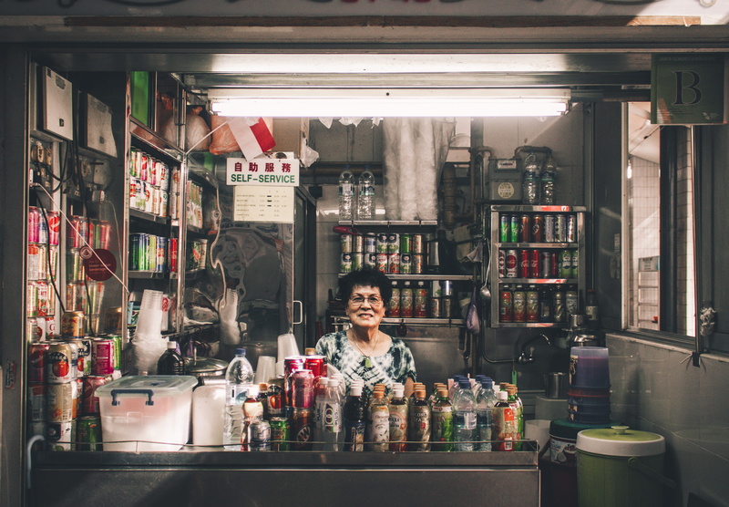 indoors, owner, glasses, shop, lifestyles, woman, market, stall, standing, lot, adult, small Business, traditional, smile, occupation, working, short hair