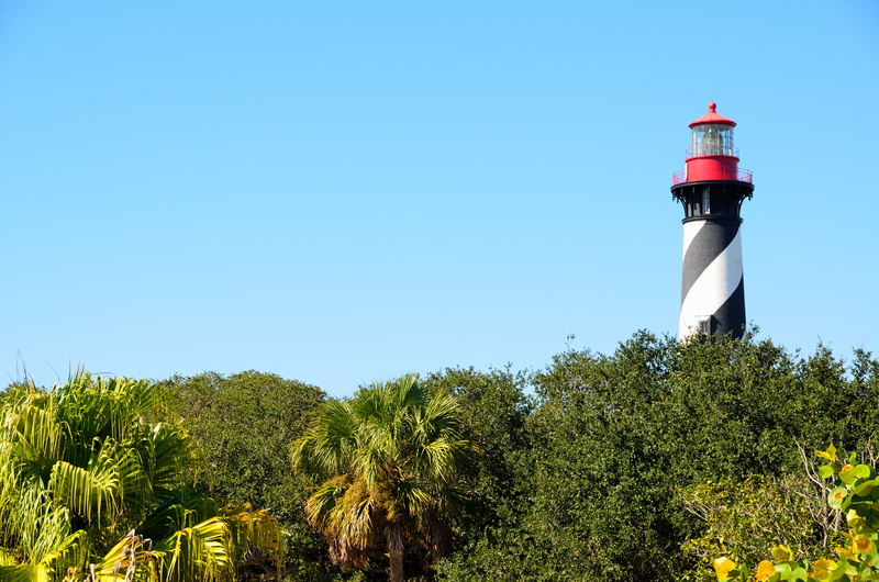 red, place, built structure, white, guidance, famous, plant, landmark, america, ocean, tree, direction, clear sky, tower, scenic, growth, travel, water