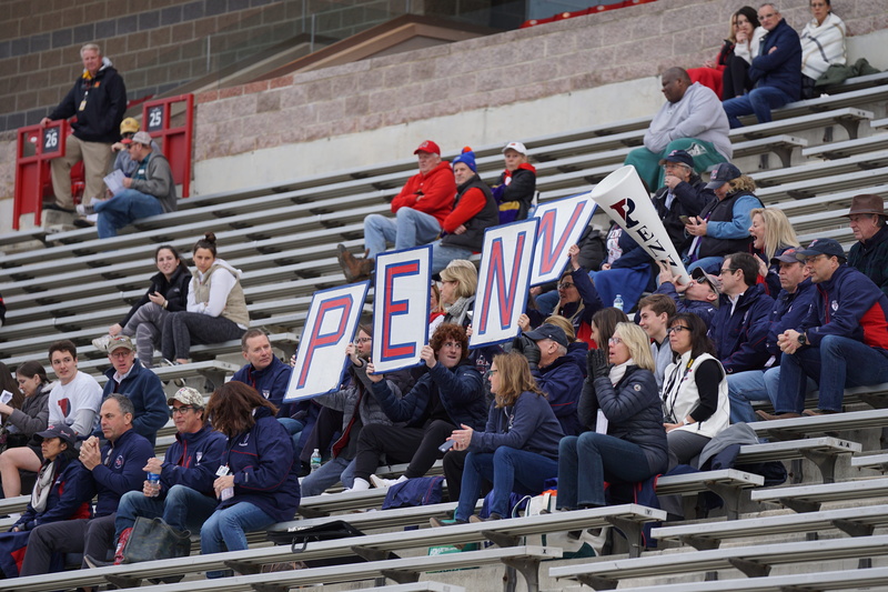 sport, railing, real people, outdoors, men, audience, jacket, large group of people, women, patriotism, banner, stadium, architecture, apparel, symbol