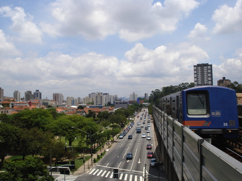 tree, architecture, travel, transportation, cities, trees, sky, Street, cityscape, skyscrapers, motor vehicle, car, day, metro, nature, traffic, land vehicle