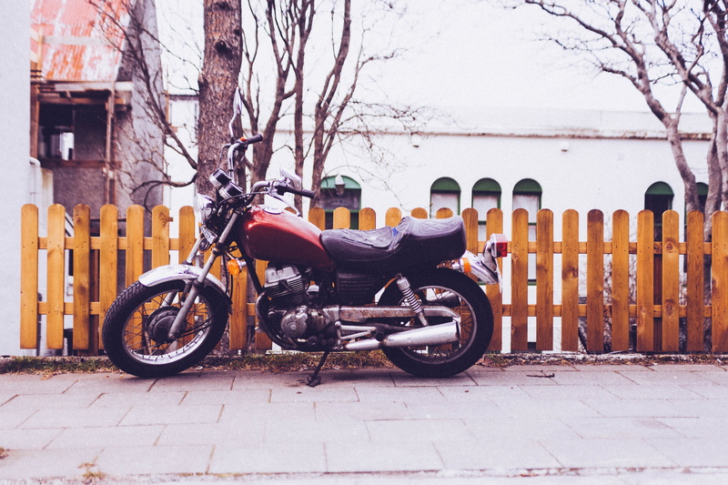 parked, Motorcycle, old-fashioned, no People, urban, railing, red, moto, outdoors, urban Scene, tree, stationary, building exterior, city, transportation