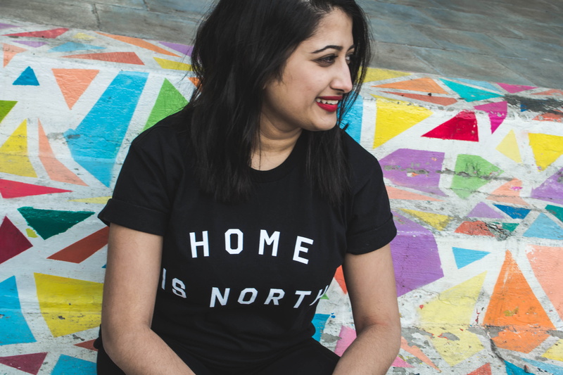 home, one person, creativity, real people, happiness, toronto, hairstyle, 4K, front view, urban, lifestyles, diversity, american, text, indoors, smiling