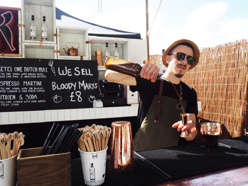 fashion, waist up, alcohol, food market, outdoors, business, sunglasses, food, vodka, portrait, leisure activity, lifestyles, sunny, london, united kingdom