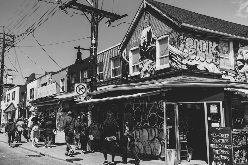 canada, real people, men, text, built structure, sky, day, crowd, communication, lifestyles, building, women, nature, kensington market, toronto, city
