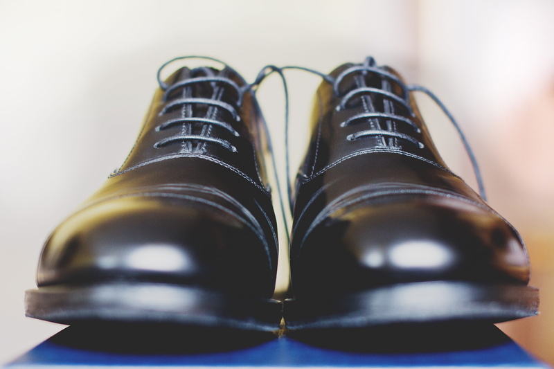 absence, still life, laces, shoe, black, pair, cap, personal accessory, indoors, calf, dress shoe, elegance, formalwear, black color, two objects, polished