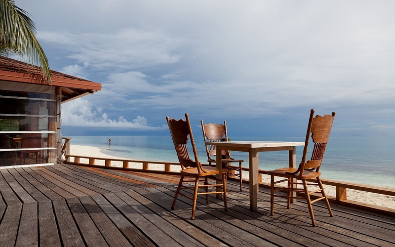 built structure, tranquil Scene, hotel, seat, idyllic, sunset, brown, sky, water, bistro, wood, beauty in nature, landscape, outdoors, tropical Climate