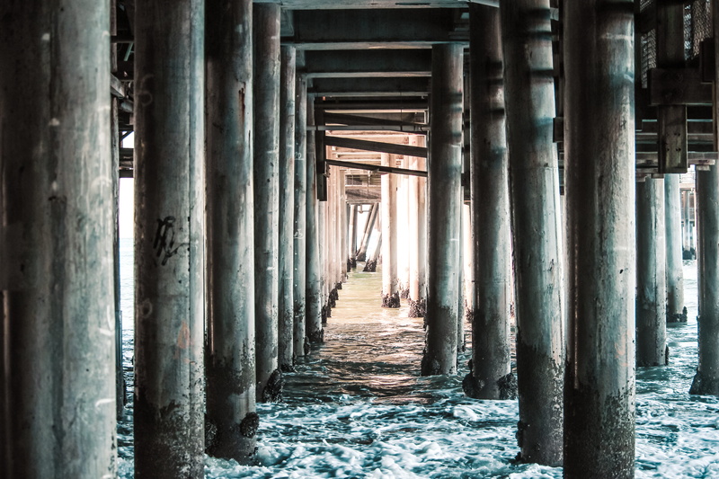 indoors, underneath, gray, diminishing perspective, in a row, 4K, no people, architectural column, bridge - man made structure, ocean, metal, built structure