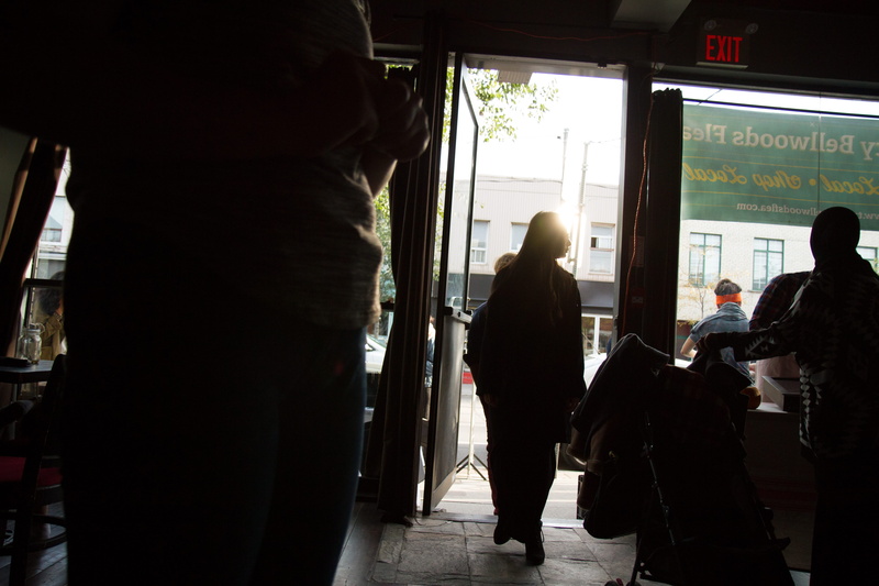 real people, mode of transportation, travel, indoors, waiting, city life, people, silhouette, incidental people, public transportation, men, storefront