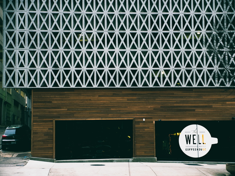 communication, no people, building exterior, glass, building, day, parked, grid, vehicle, 5K, geometric shape, pattern, text, outdoors, beside, wall, white