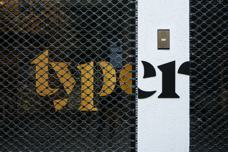 architecture, built structure, outdoors, athens, logo, wire, communication, metal, type, divided, storefront, no people, font, close-up, day, fence, pattern